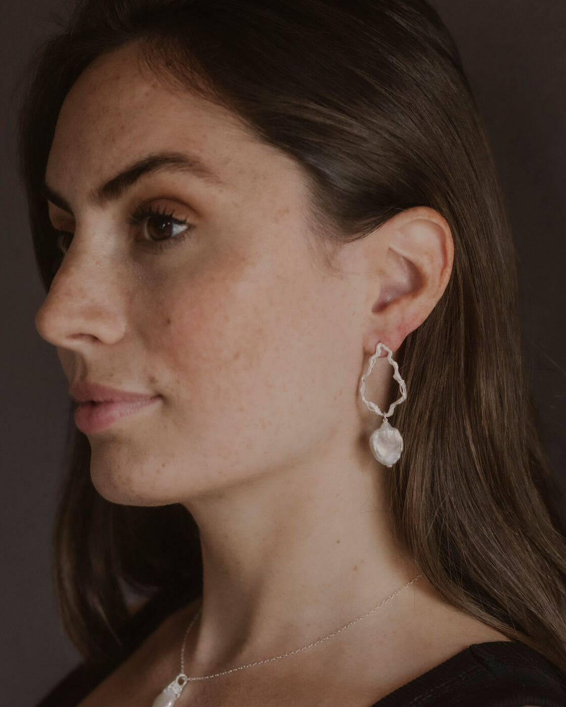 model wears Pearl Silver Branch Drop Earrings