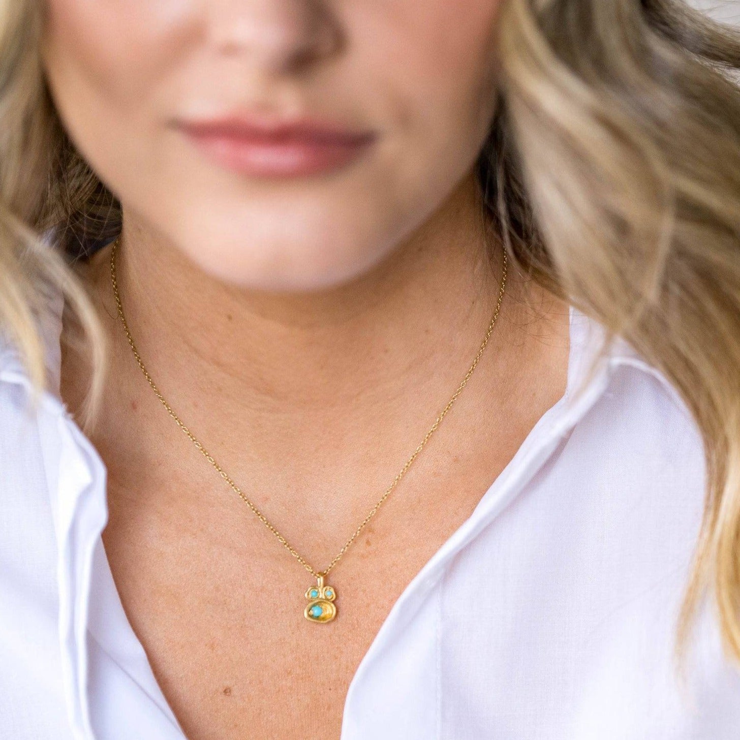 model wears Turquoise and Gold Birthstone Lichen Pendant Necklace