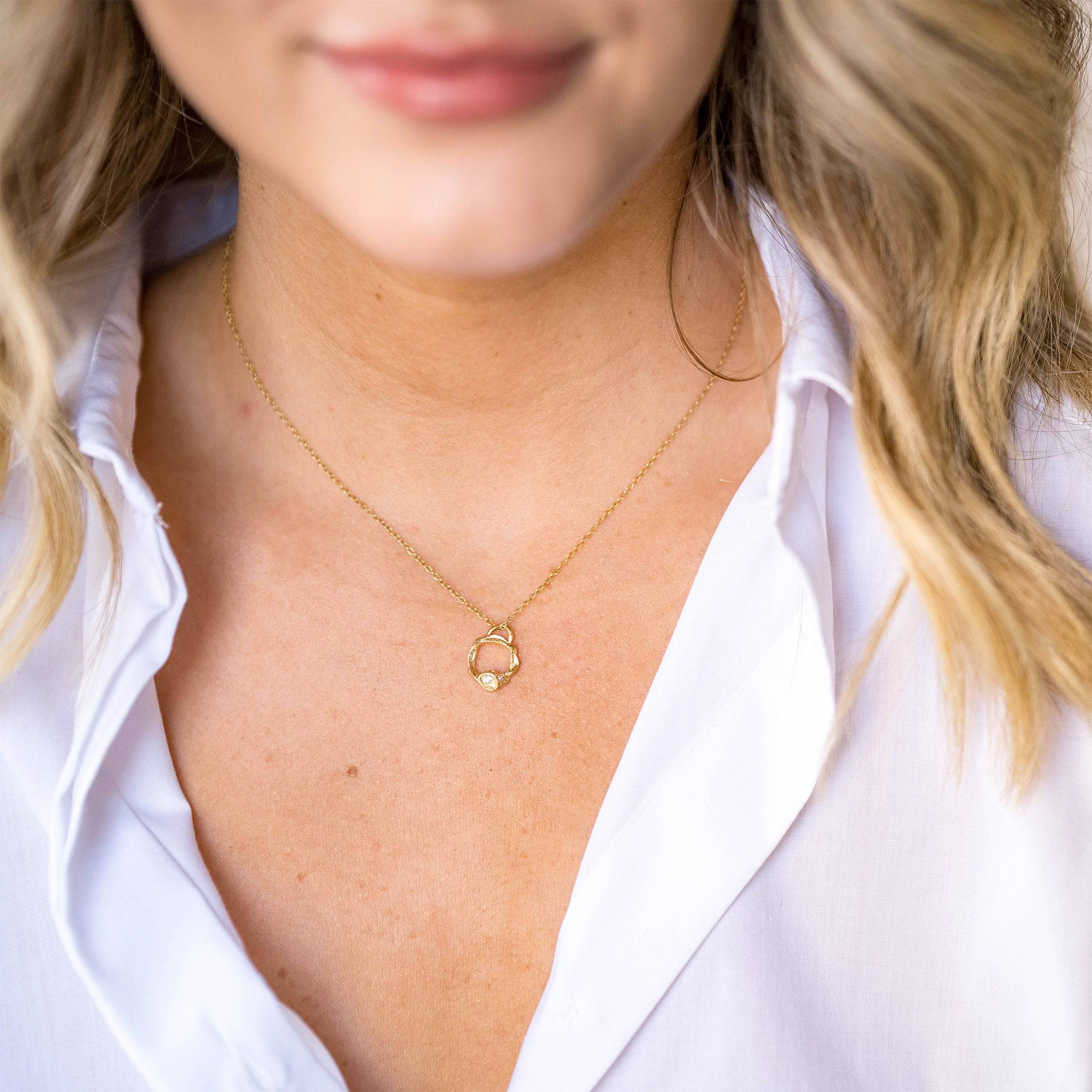 model wears White Topaz and Gold Birthstone Branch Circle Necklace - Small