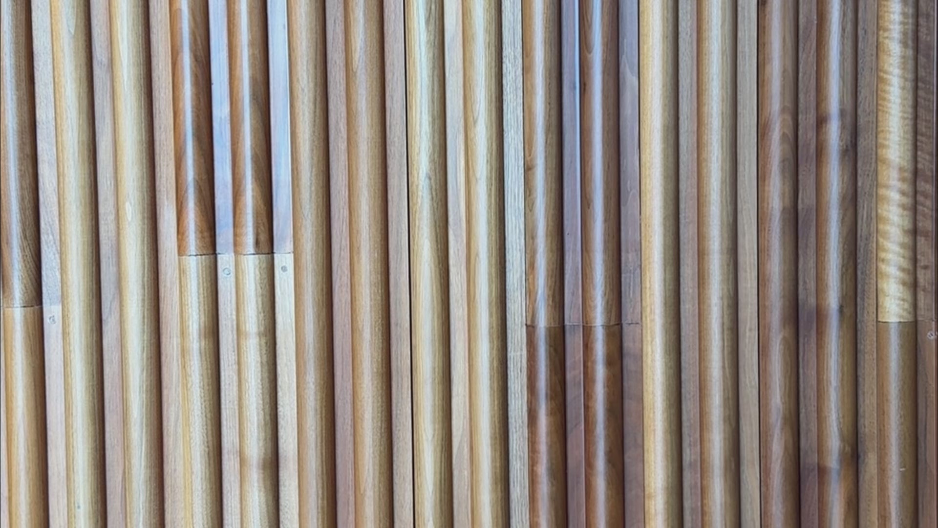 Lorna layers up her jewellery wearing hoop earrings, and charm necklace