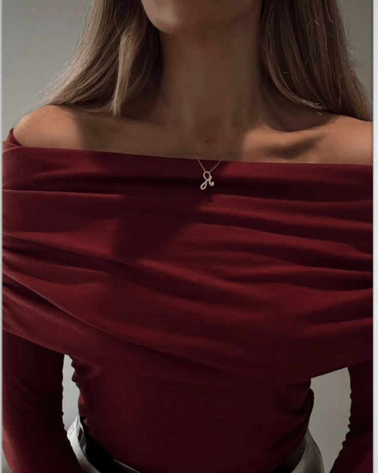 Rach London wears Fearless Shorthand charm necklace