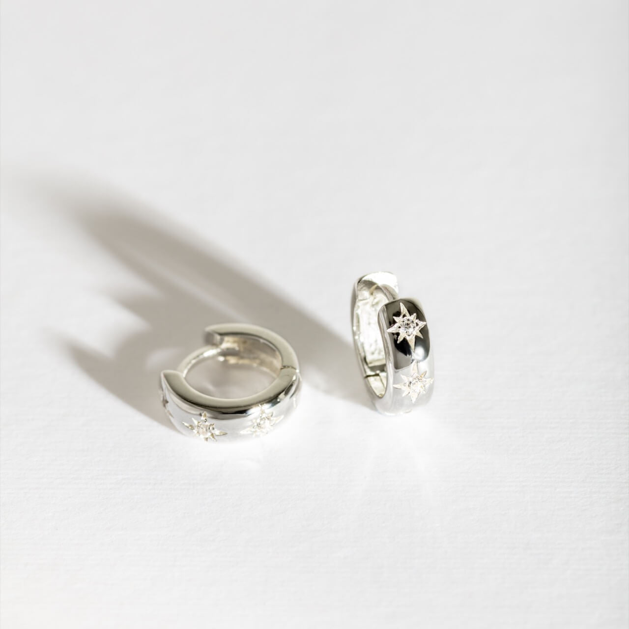 Silver Sparkly Star Huggie Earrings