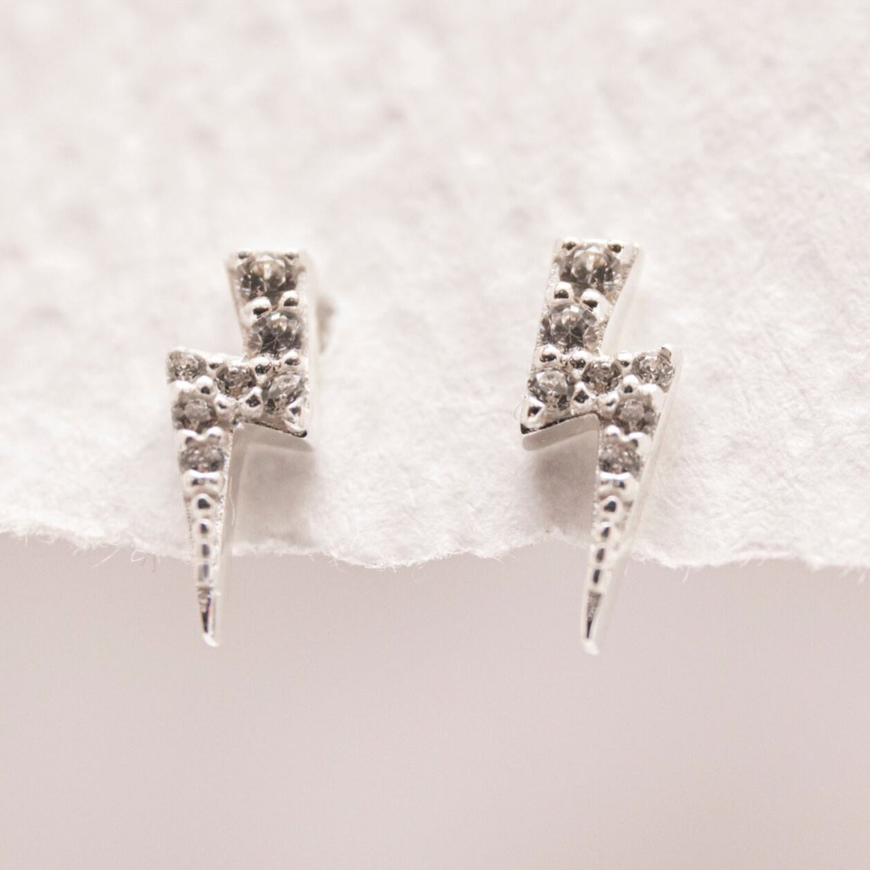 Sparkly Silver Lightning Bolt Stud Earrings