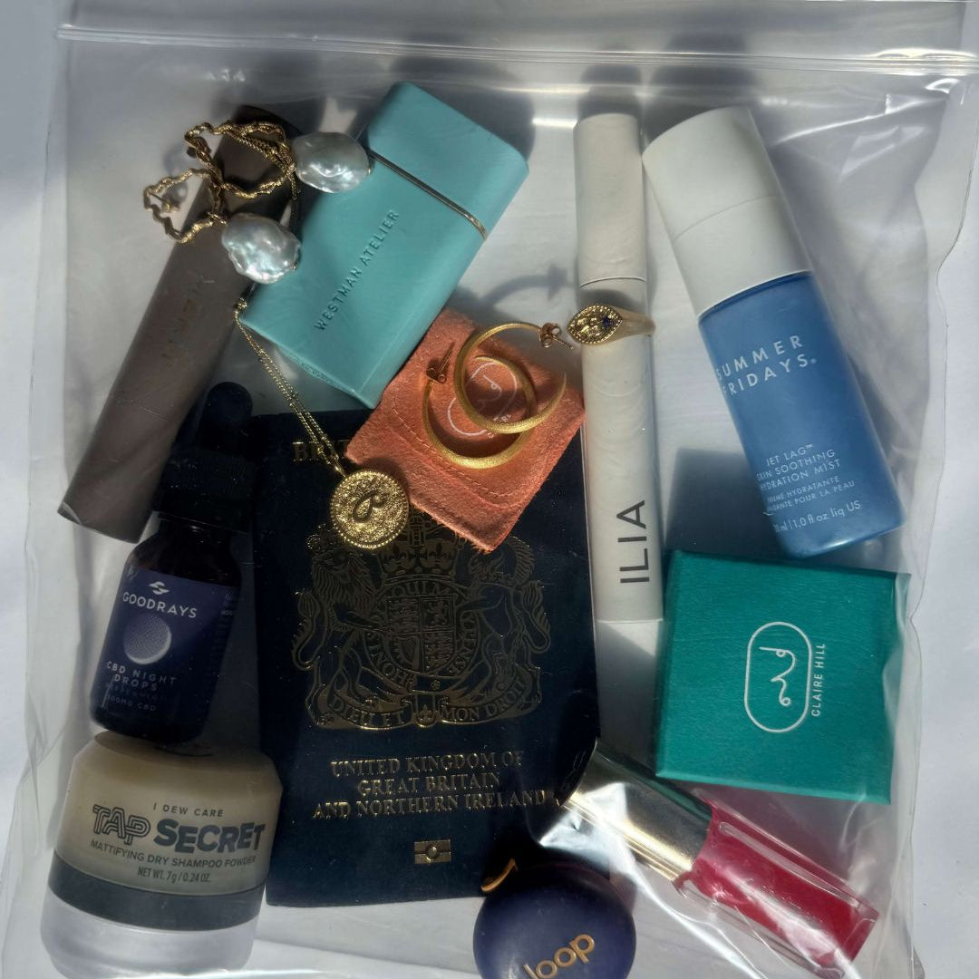 Clear plastic airplane carry on bag with jewellery, make up and essenntials 