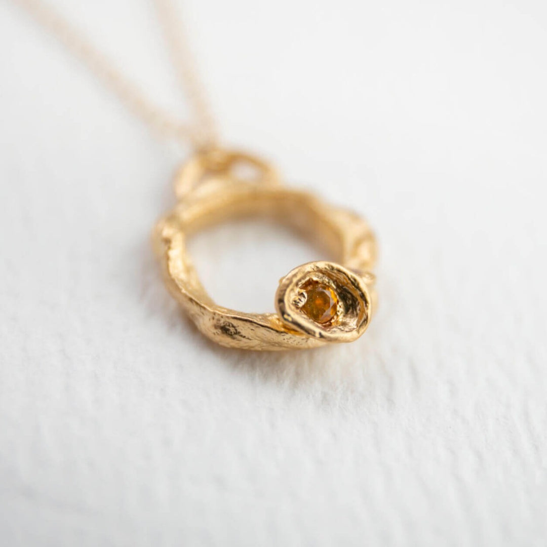 close up of   14k gold vermeil citrine gemstone birthstone small eternity necklace