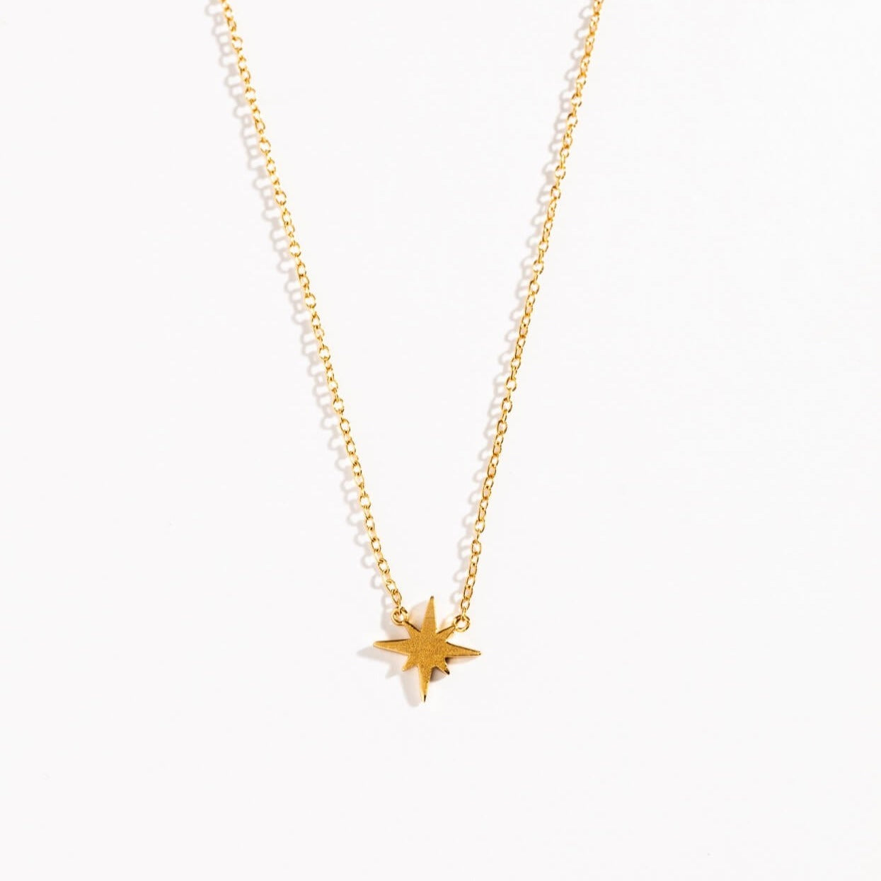  Analyzing image      18k-gold-vermeil-brushed-star-necklace-claire-hill-designs