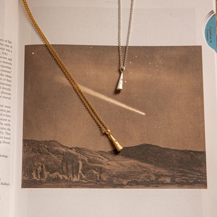Group shot of Silver Comet Charm Necklace and 18k Gold Vermeil Comet Charm Necklace - Claire Hill Designs
