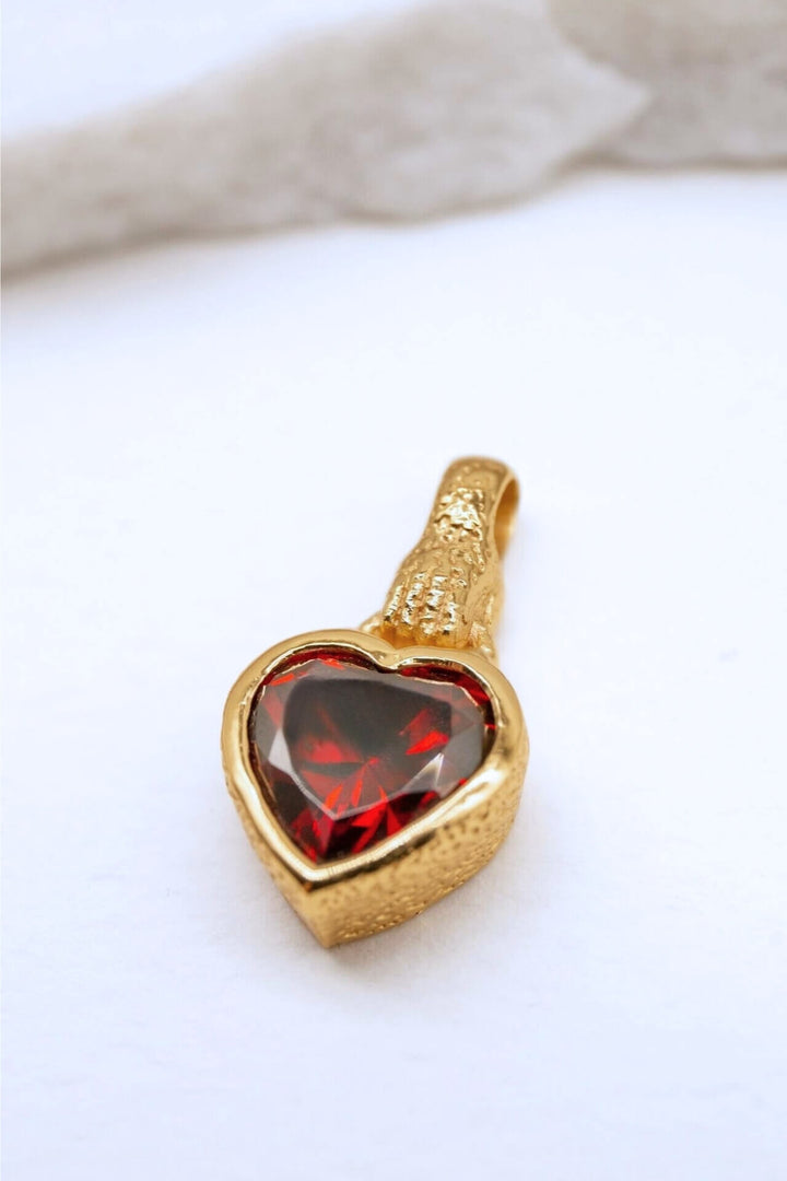 Garnet Heart in Hand Gold Charm Pendant