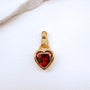 Garnet Heart in Hand Gold Charm Pendant