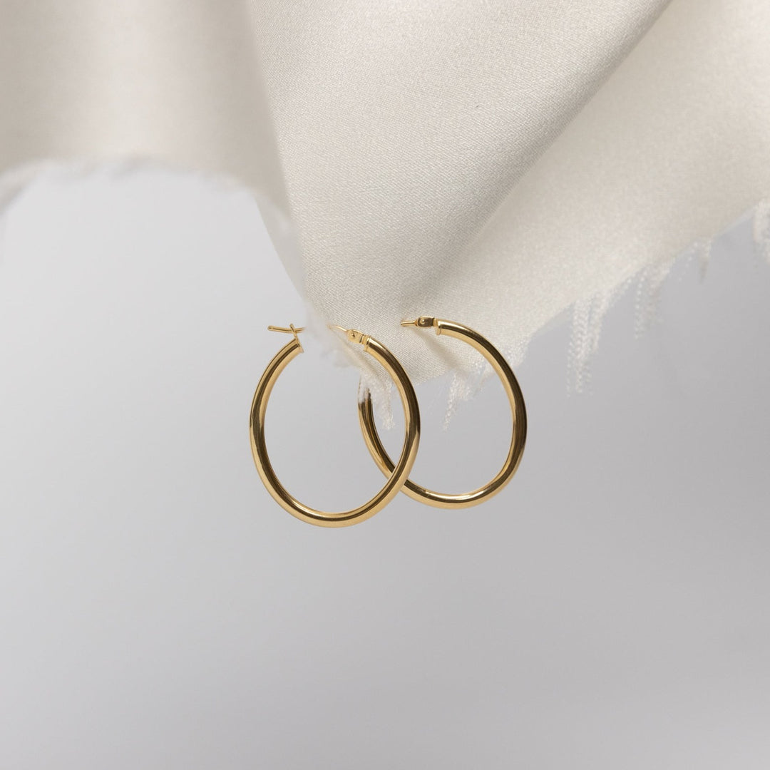 9ct-solid-gold-oval-24mm-hoop-earrings-claire-hill-designs