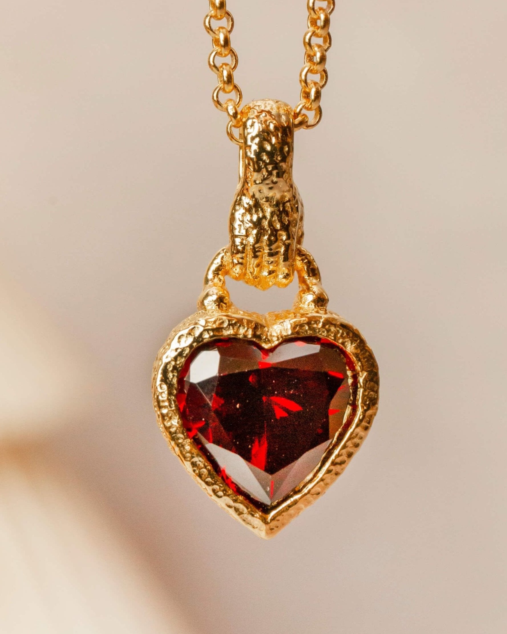 gold hand in heart charm necklace