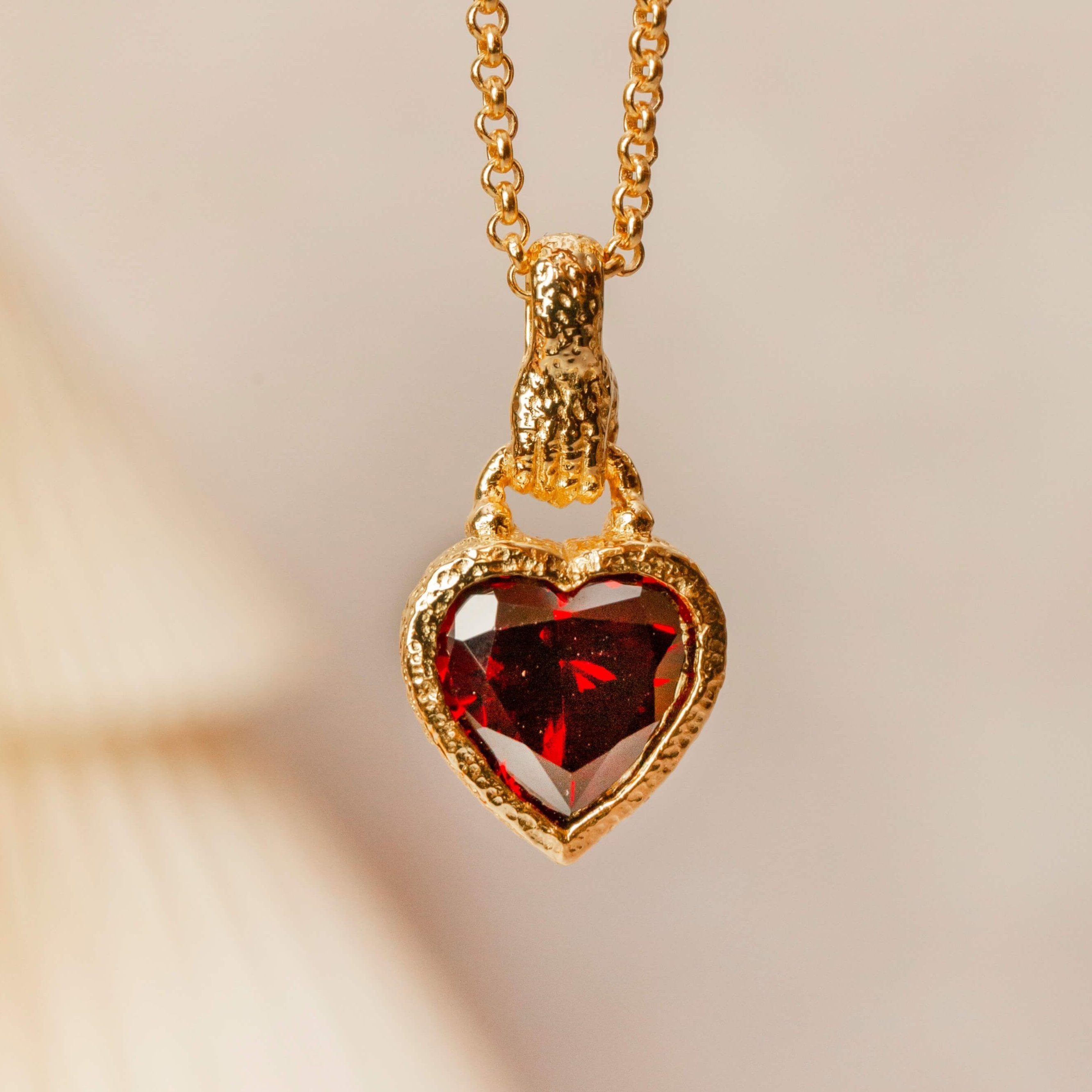 gold hand in heart charm necklace