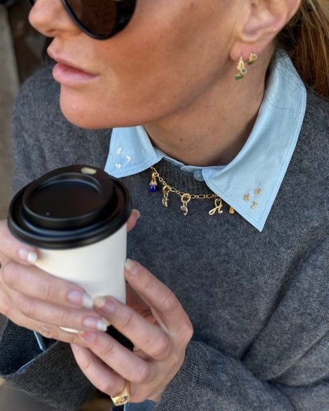 model wears Chalcedony Twisted Branch Gold Hoops