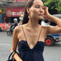 model wears Pearl Gold Branch Drop Earrings