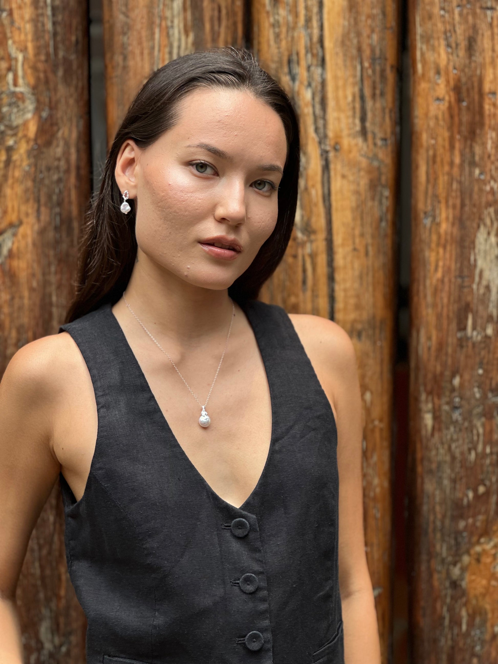 model wears Pearl Silver Lichen Pendant Necklace 
