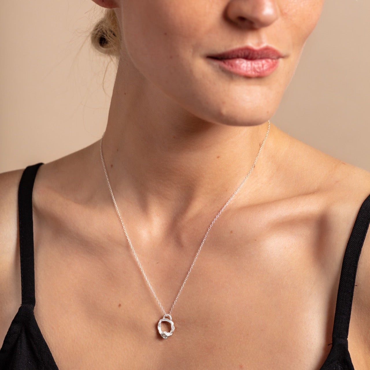 all-groups Laura wears small moonstone  silver birthstone necklace