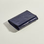 Navy leather jewellery roll 