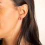 model wears Pink Ruby 9ct Solid Gold Chain Stud Earrings