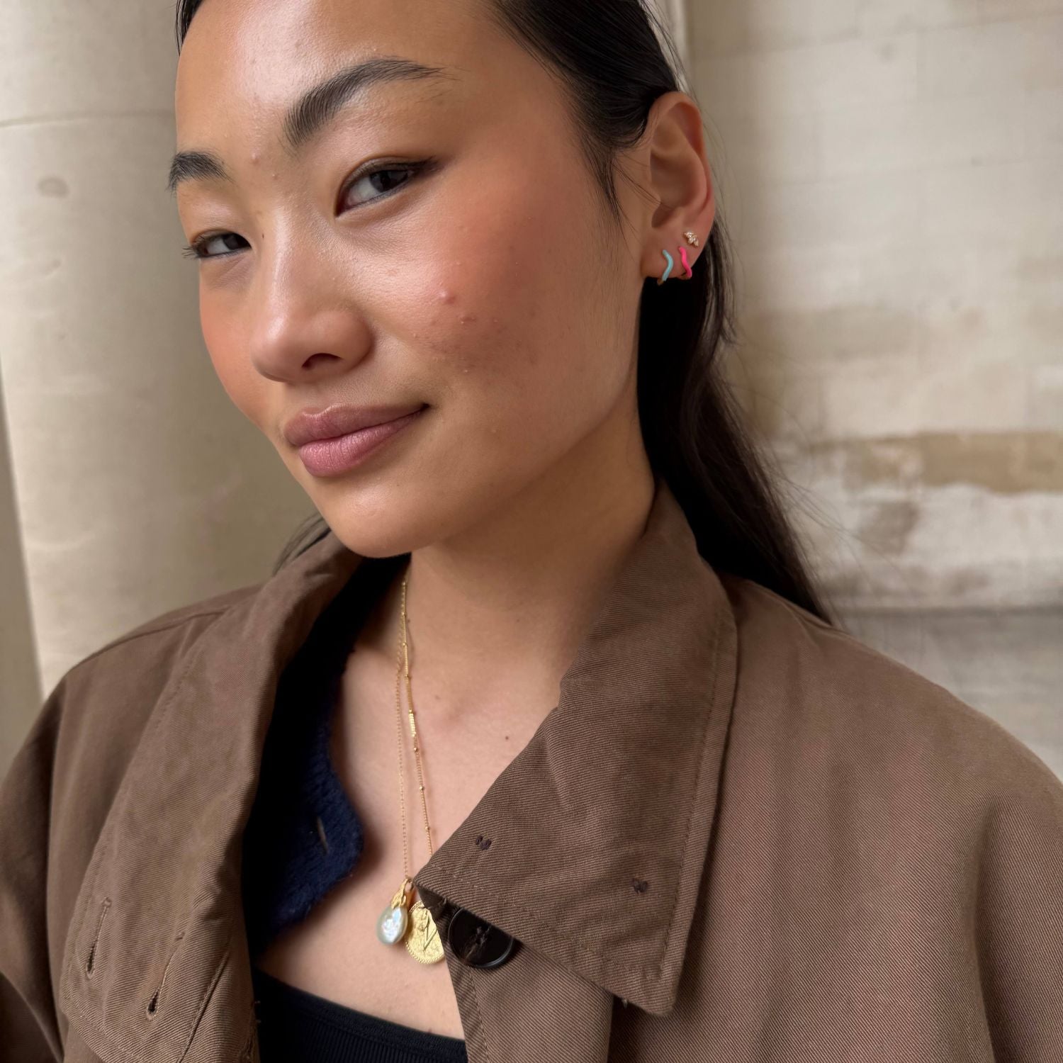 Jade wears Hot Pink and Turquoise
 Wavy Enamel Huggie Hoops