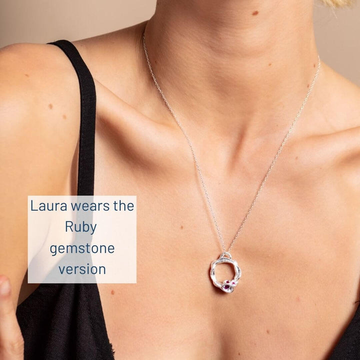 Laura wears ruby version