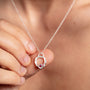 all-groups Laura wears small ruby silver birthstone necklace