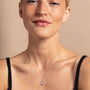 all-groups Laura wears small sapphire silver birthstone necklace