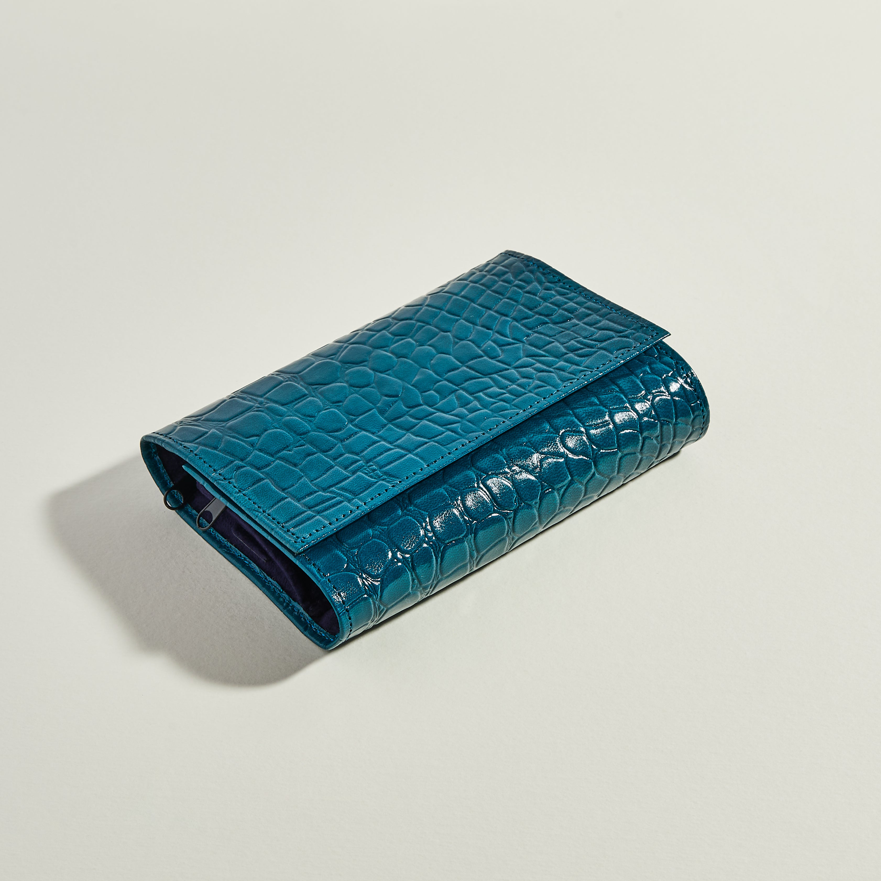 Teal leather jewellery roll 