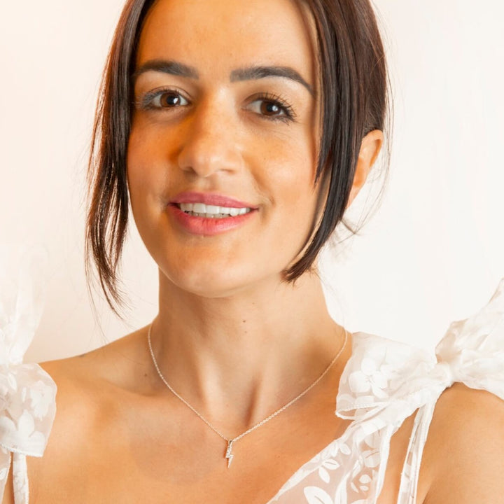 model wears Sparkly Silver Lightning Bolt Necklace