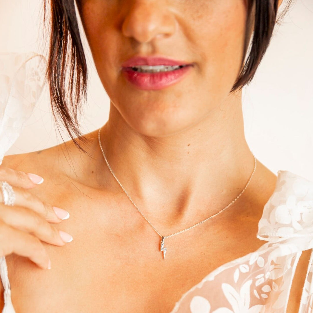 model wears Sparkly Silver Lightning Bolt Necklace