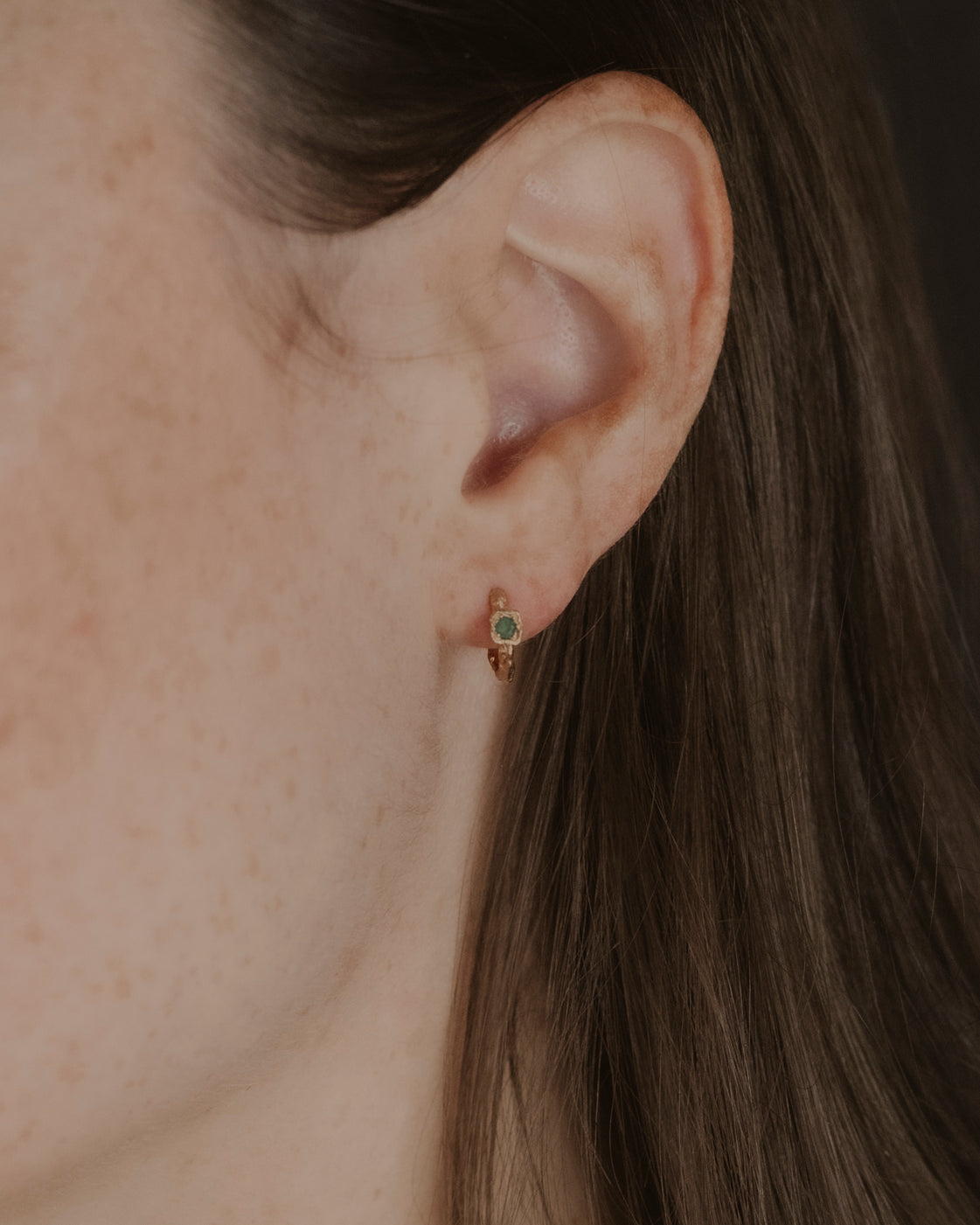 model wears Chalcedony Lichen Branch Gold Huggies