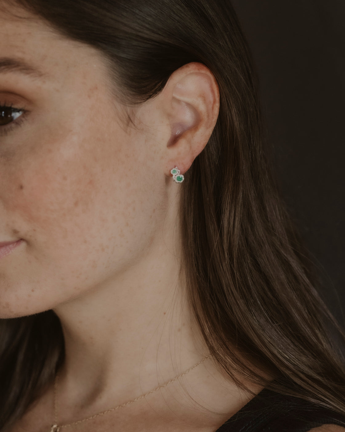 model wears Chalcedony Twisted Branch Silver Huggies