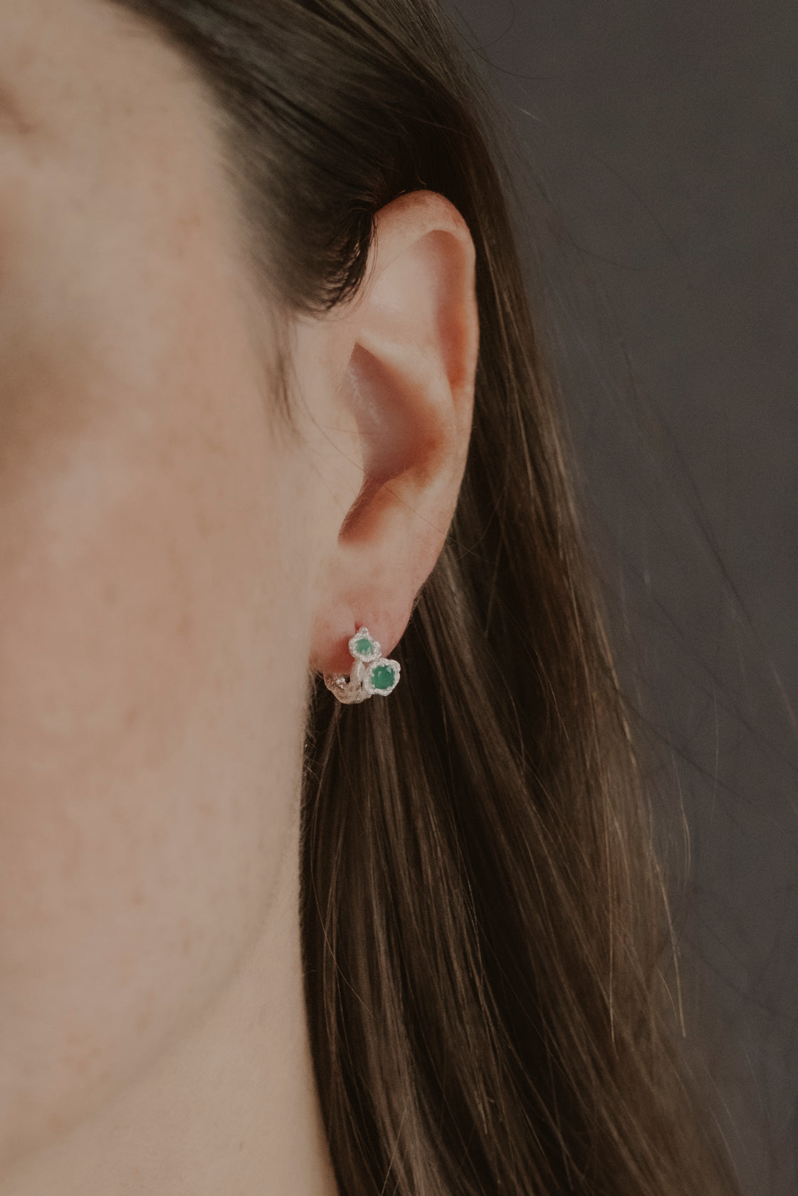 model wears Chalcedony Twisted Branch Silver Huggies