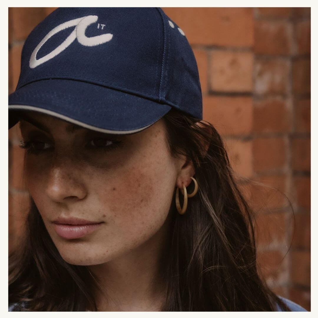 Model wears Fuck It Baseball cap