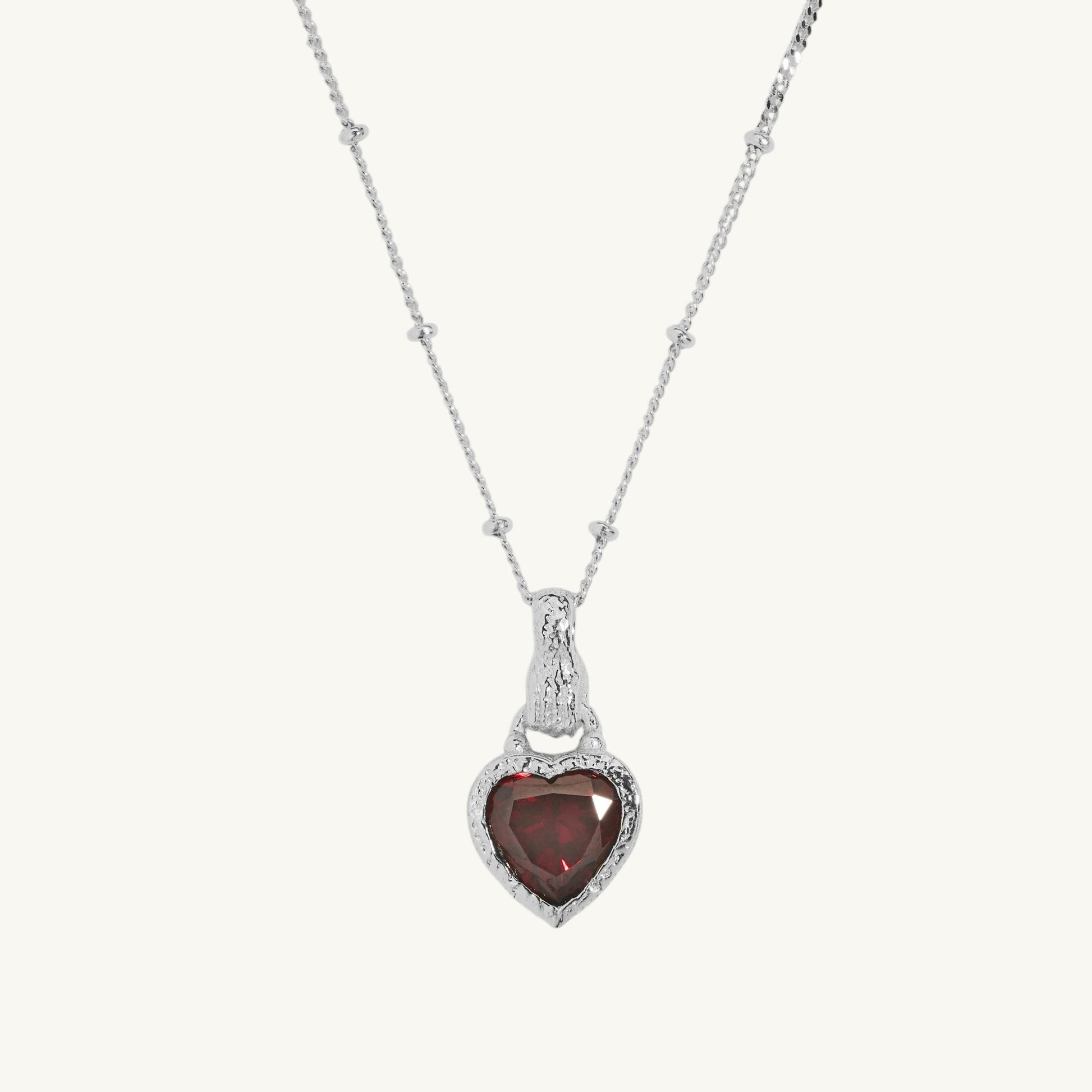 Garnet Heart in Hand Silver Charm Necklace