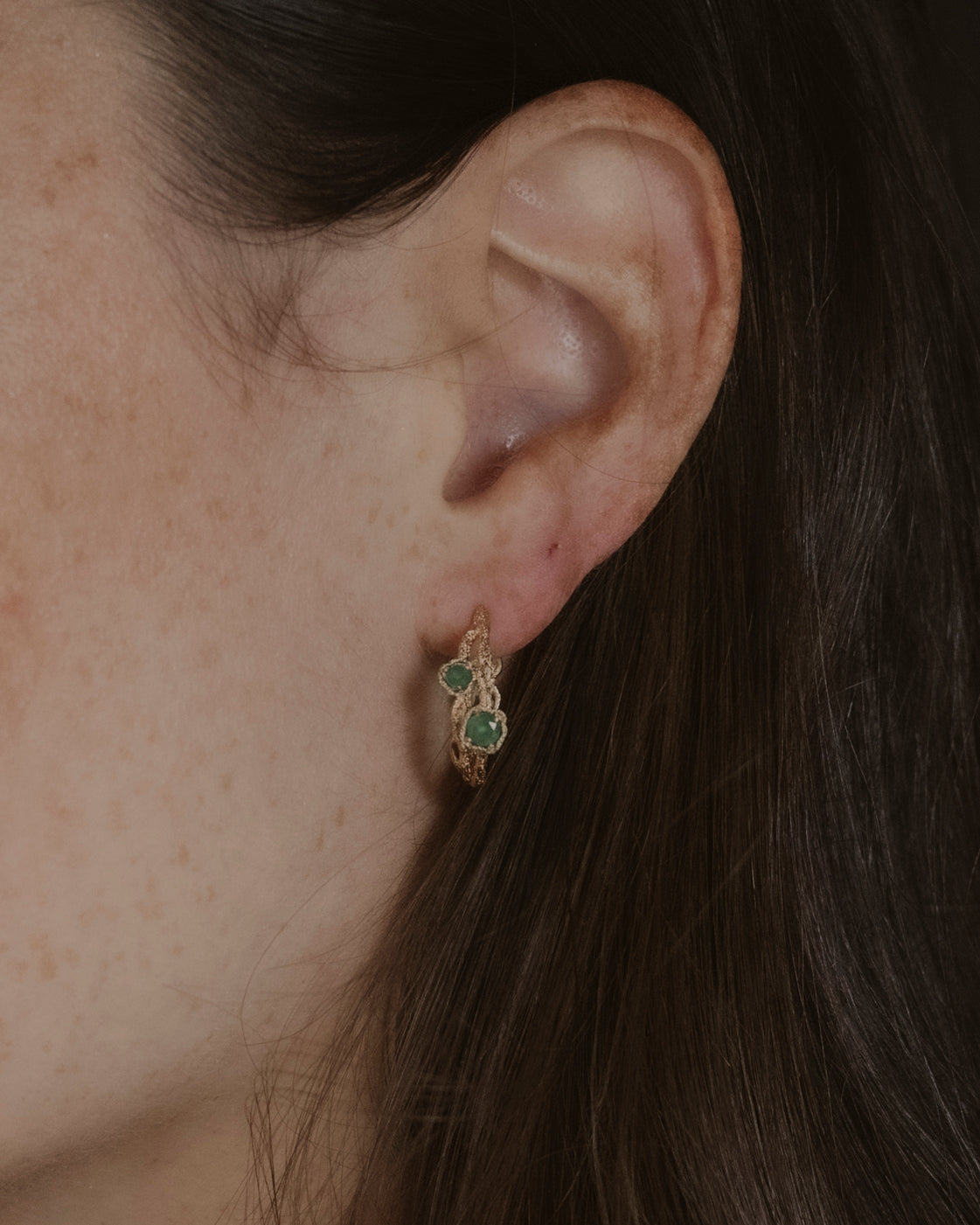 model wears Chalcedony Twisted Branch Gold Hoops