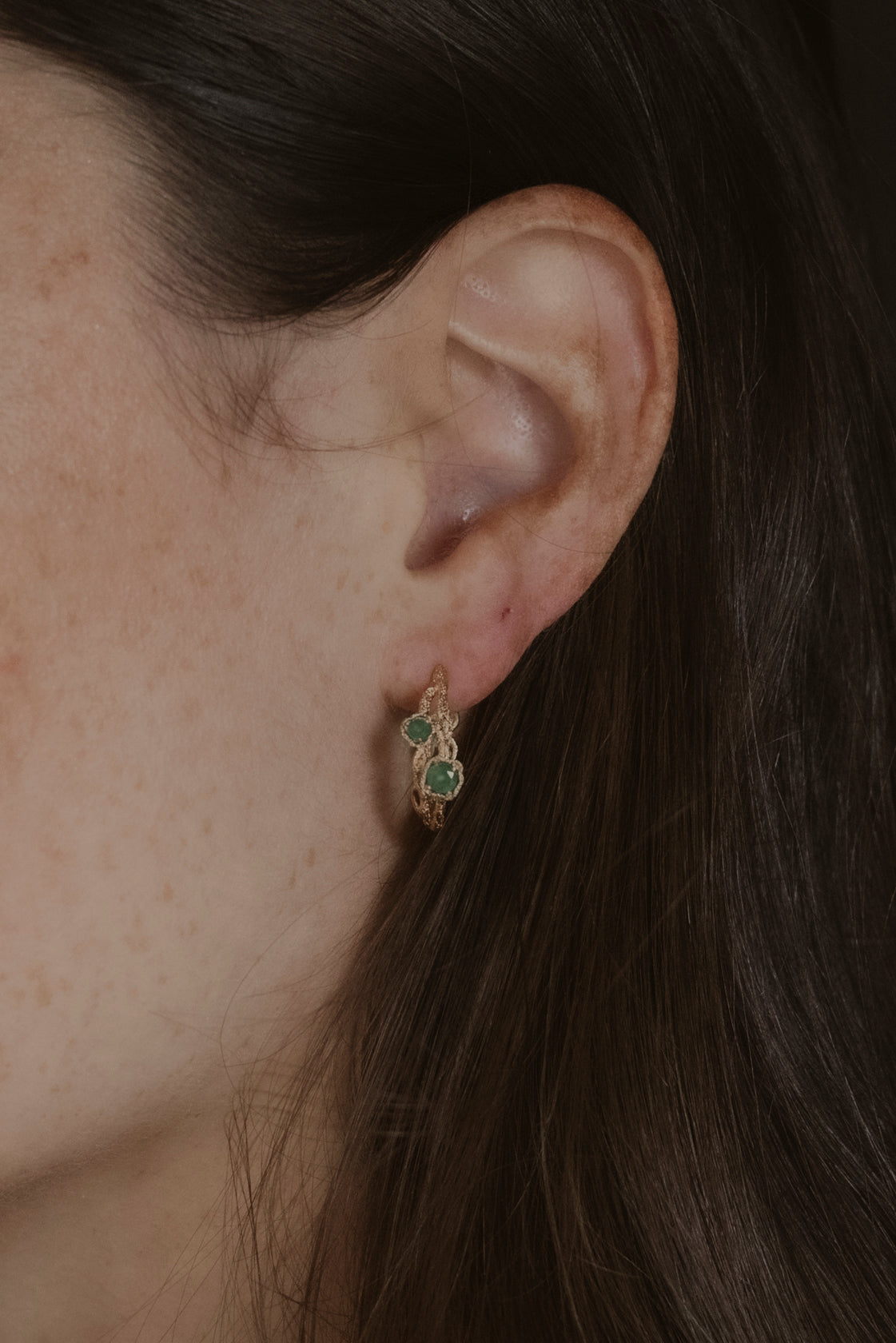 model wears Chalcedony Twisted Branch Gold Hoops