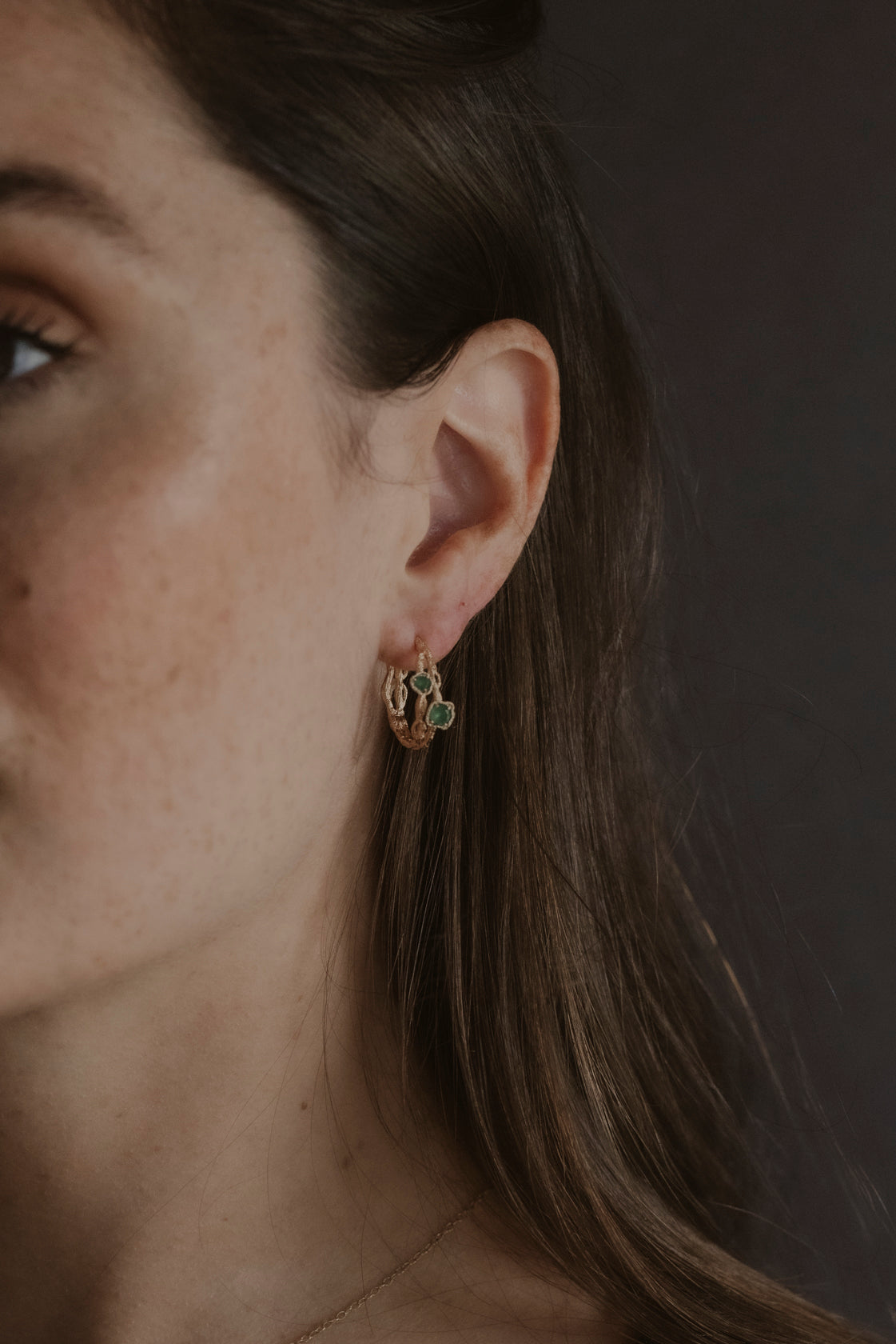 model wears Chalcedony Twisted Branch Gold Hoops