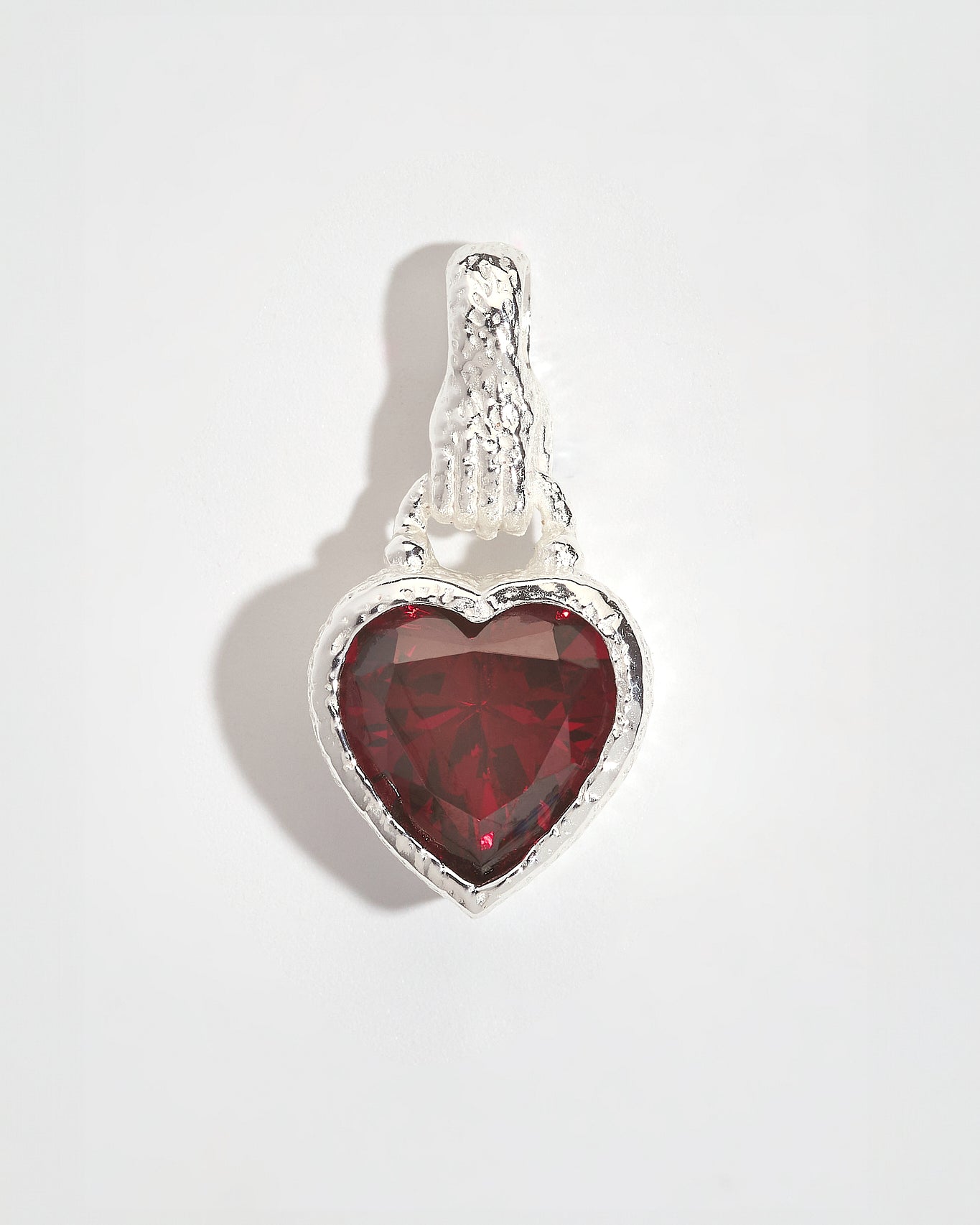 Garnet Heart in Hand Silver Charm Pendant