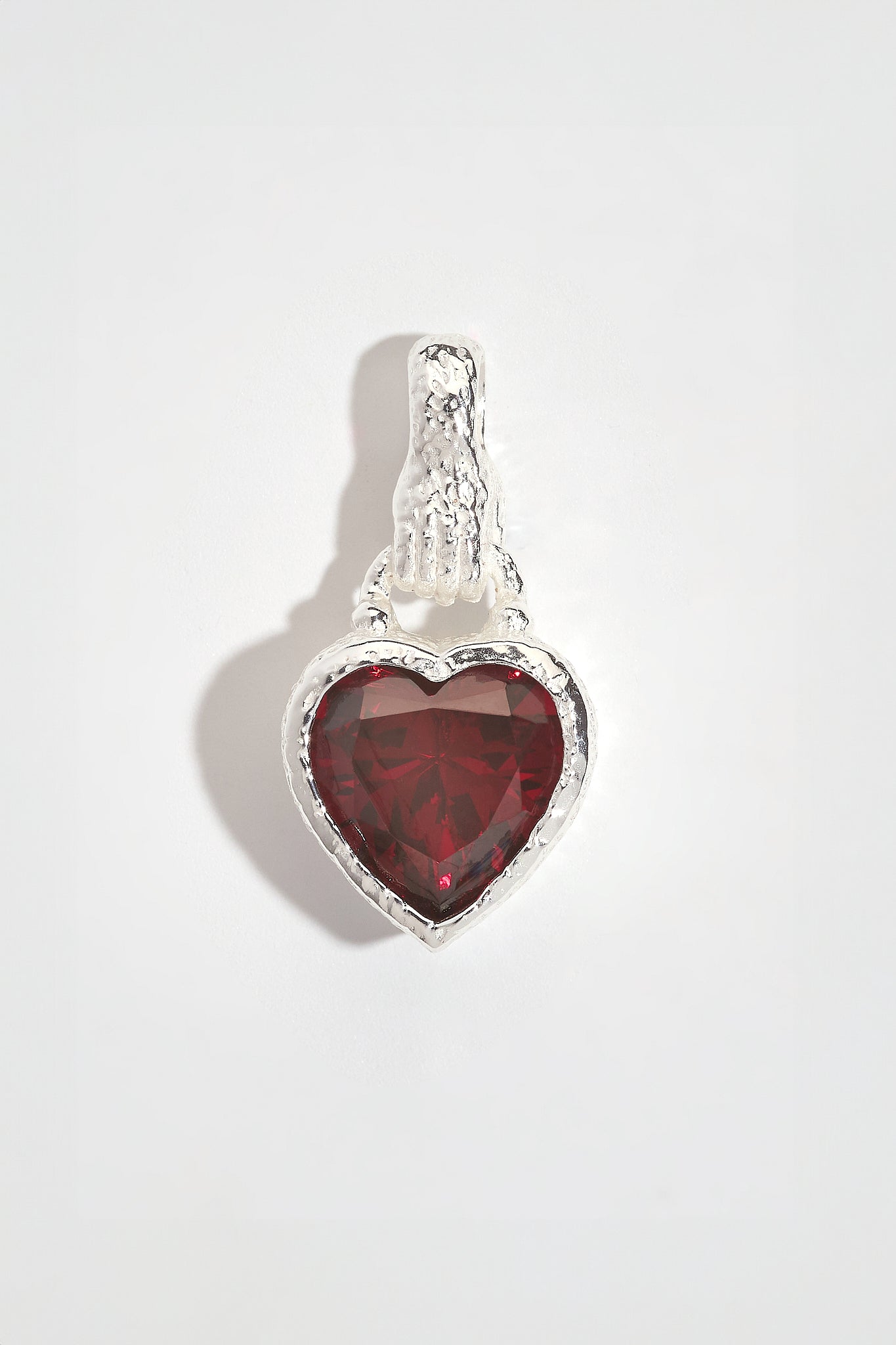 Garnet Heart in Hand Silver Charm Pendant