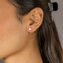 Jade wears Brushed Heart Silver Stud Earrings