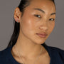 Jade wears Turquoise
 Wavy Enamel Huggie Hoops