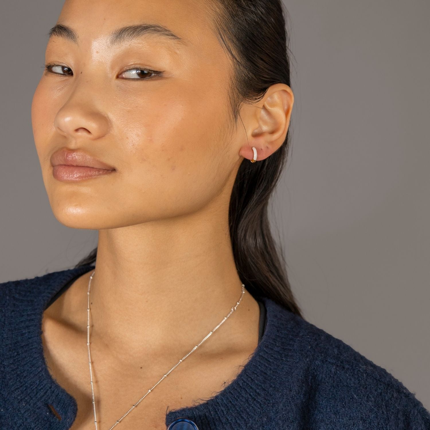 White Enamel Gold Huggie Earrings