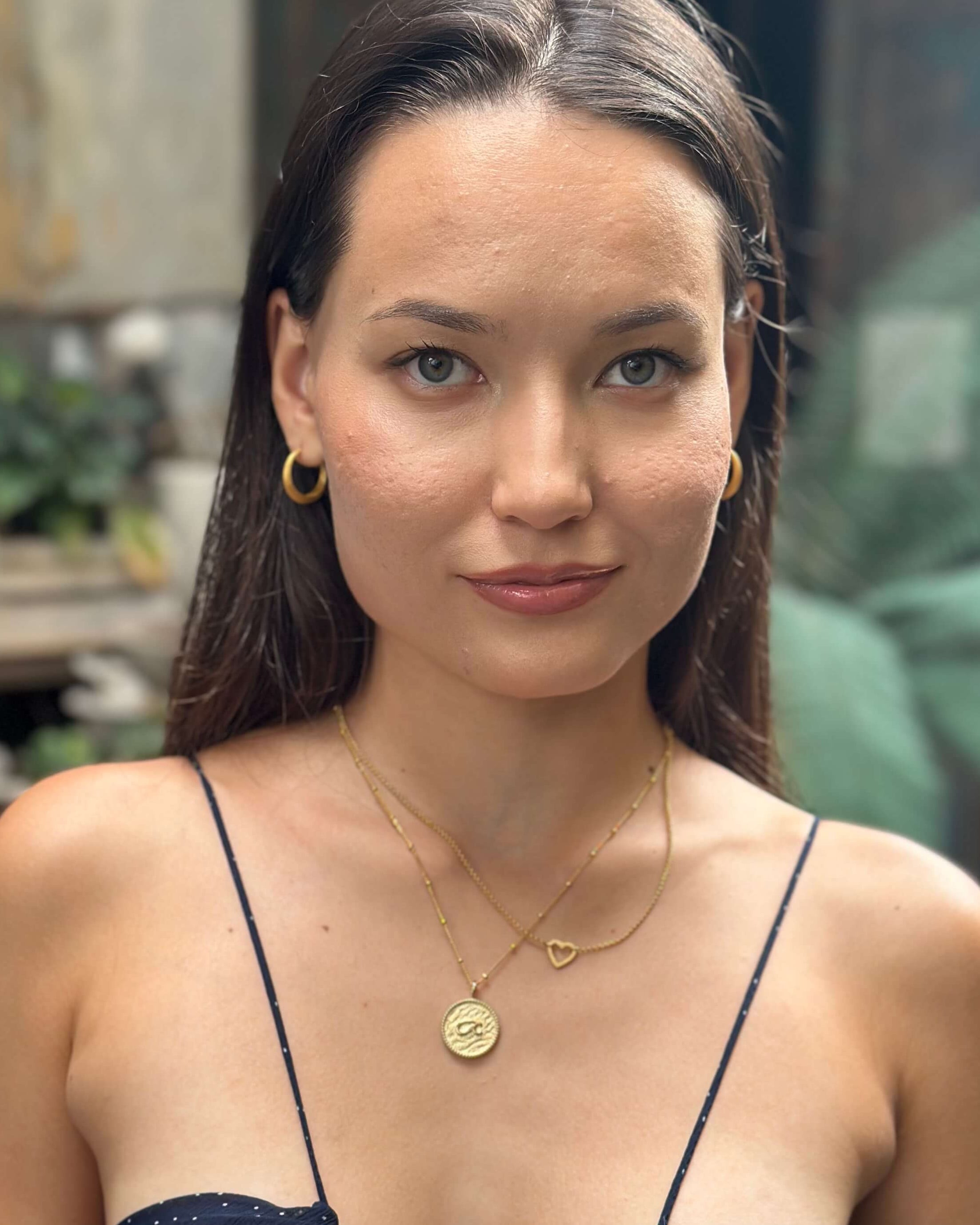 April wears Fuck Shorthand necklace and Heart Connector Necklace