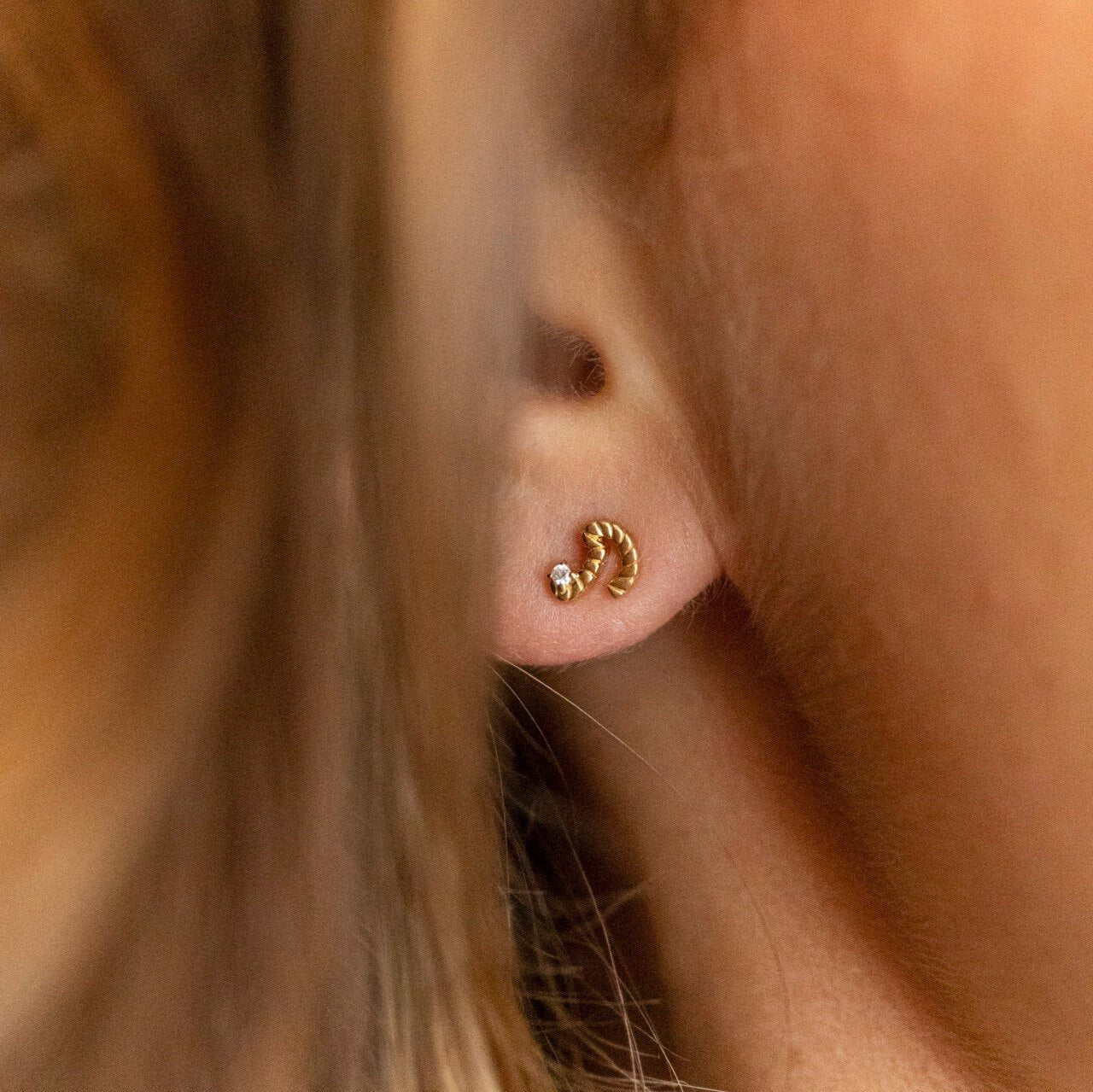 model wears 14k Gold Vermeil Shorthand Stud Earring meaning Courage - Claire Hill Designs 