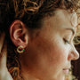model wears Emerald and 14k Gold Vermeil Asymetric Statement Stud Earrings