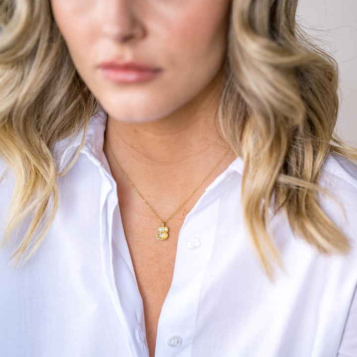 model-wears-14k-gold-vermeil-aquamarine-birthstone-lichen-pendant-drop-necklace-claire-hill-designs