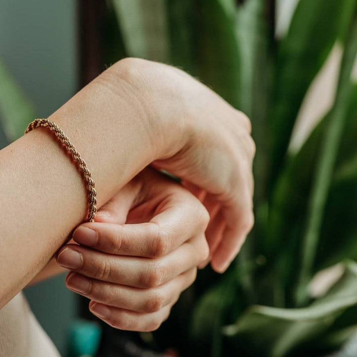model wears Gold Rope Bracelet
