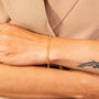 model wears Layered Delicate Gold Chain Bracelet