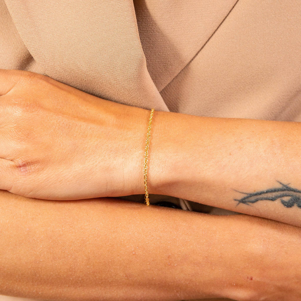 model wears Layered Delicate Gold Chain Bracelet