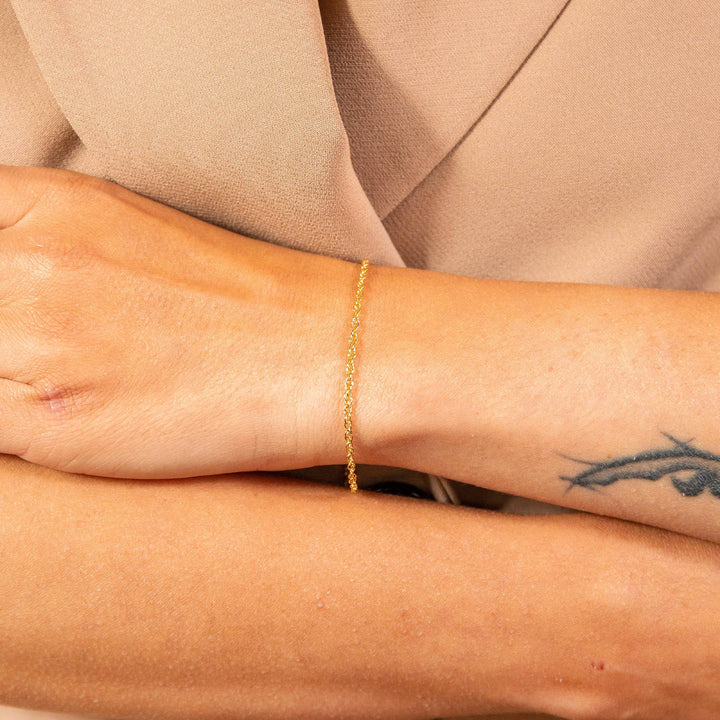 model wears Layered Delicate Gold Chain Bracelet